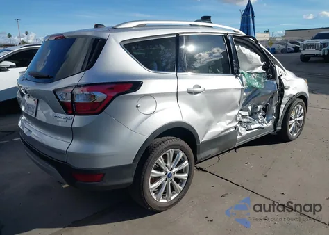 2017 Ford Escape Titanium from USA, damaged, VIN 1FMCU0J9XHUD85355